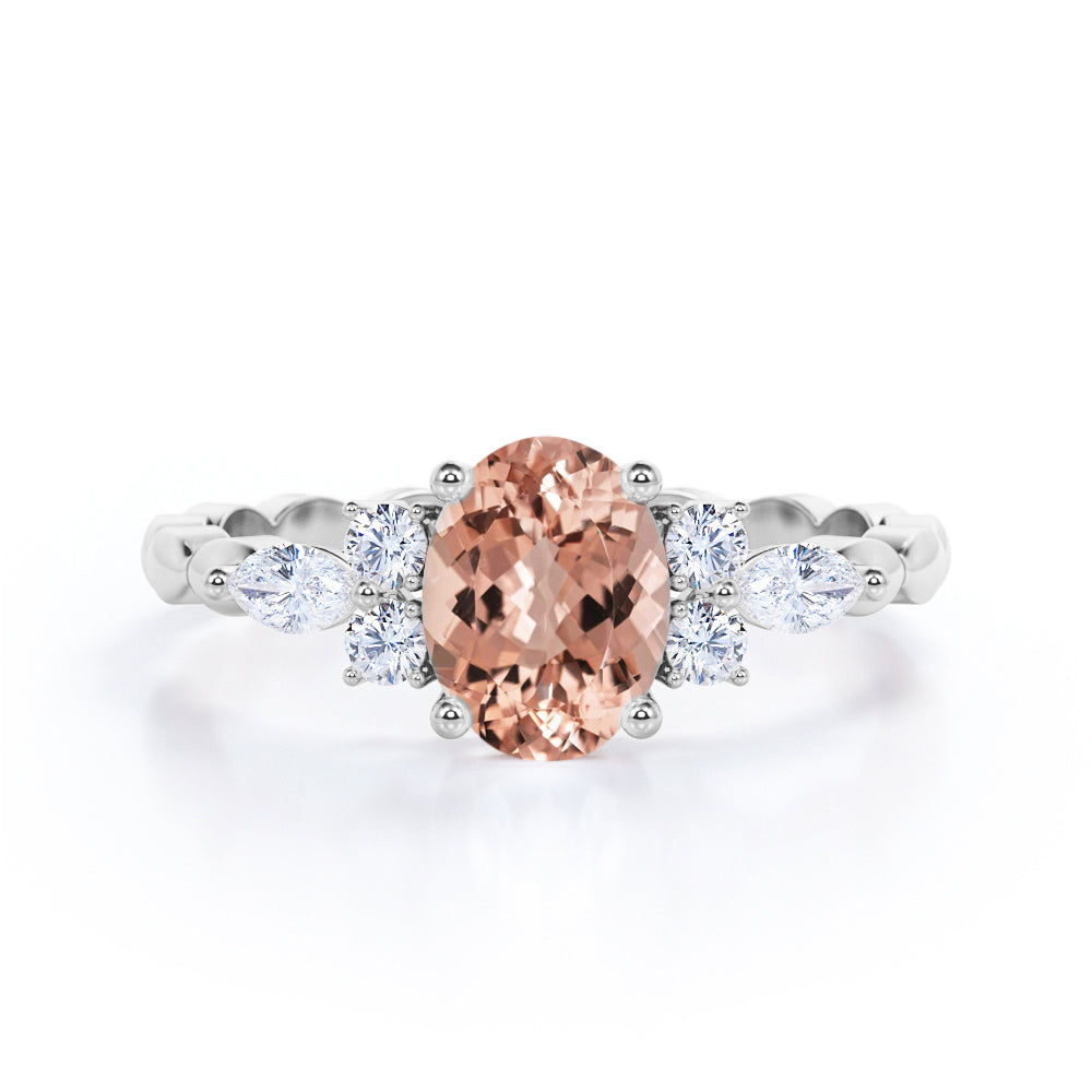 Twisted Bands 1.15 carat Oval shaped Peach Morganite and diamond 