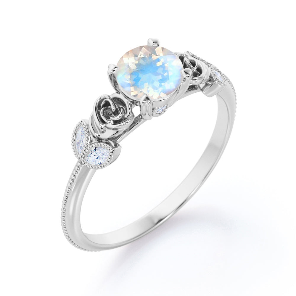 Vintage Rose 1.1 carat Round cut Blue Moonstone and marquise diamond engagement ring in White gold