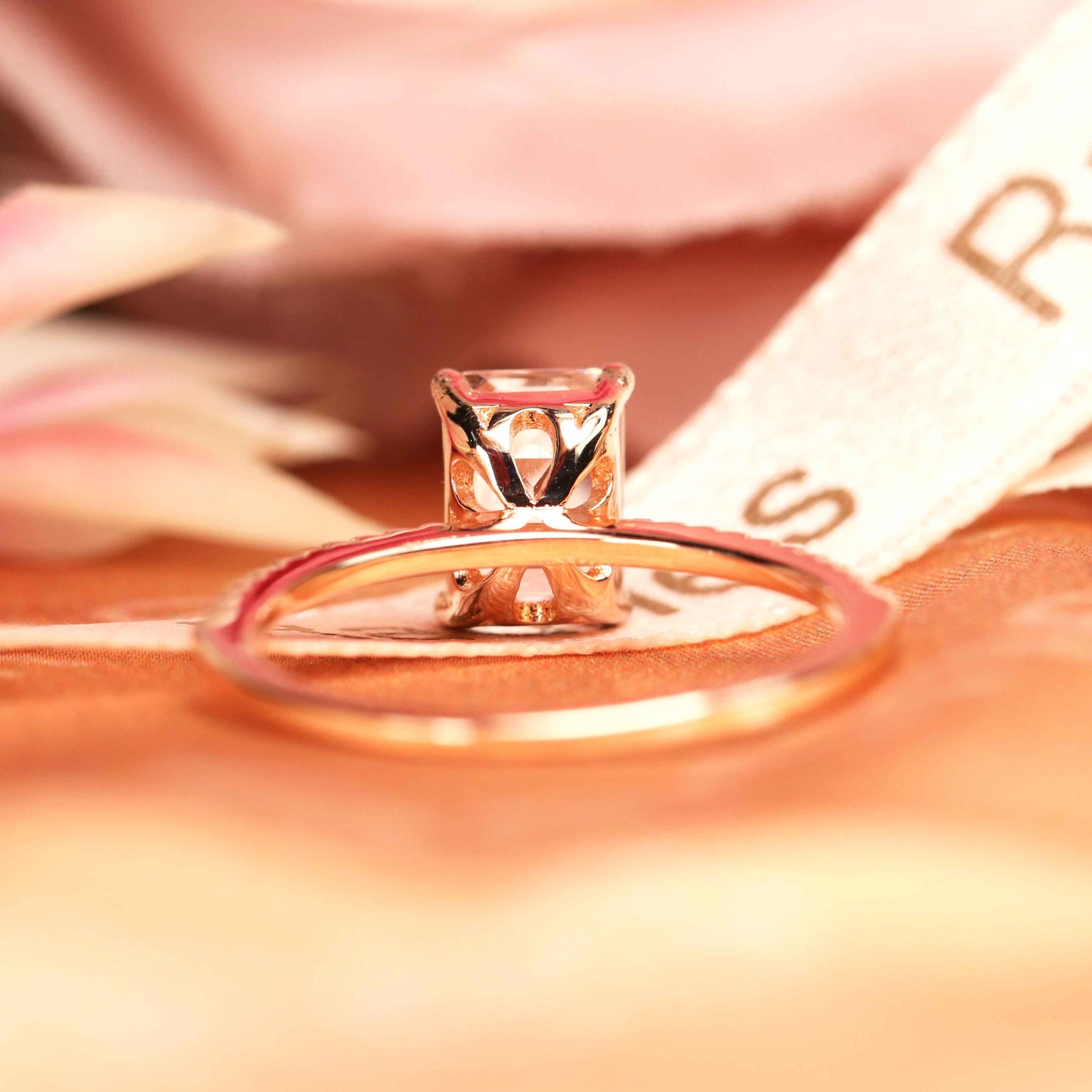 Classic 1.25 carat emerald cut peach pink Morganite Engagement Ring in Rose Gold