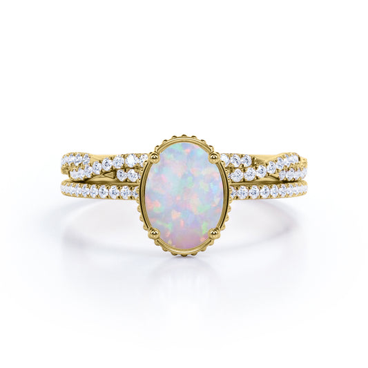 Milgrain halo 1.5 carat Oval cut Ethiopian Opal and diamond half-infinity Bridal set for her