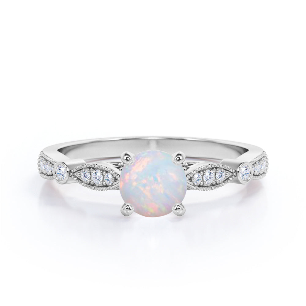 Artdeco Milgrain 1.25 carat Round cut Australian Opal and diamond Cathedral setting engagement ring in White gold