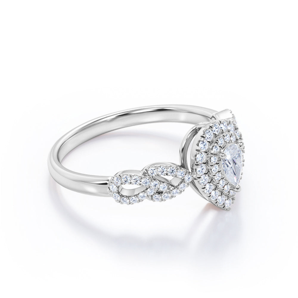 Stylish leaf inspired 0.75 carat Pear cut diamond double halo pear engagement ring in White gold