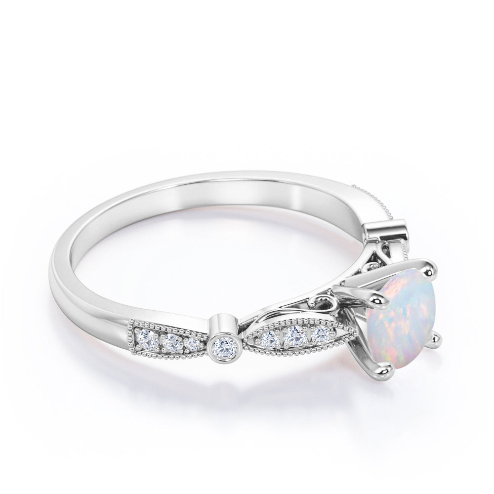 Artdeco Milgrain 1.25 carat Round cut Australian Opal and diamond Cathedral setting engagement ring in White gold