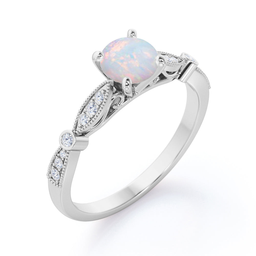 Artdeco Milgrain 1.25 carat Round cut Australian Opal and diamond Cathedral setting engagement ring in White gold