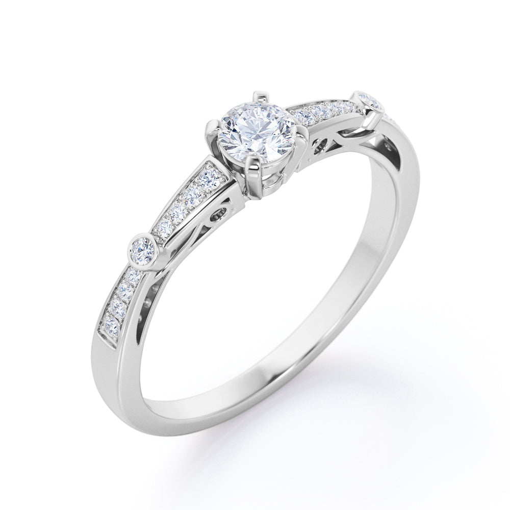 Elegant 0.5 carat Round cut diamond art nouveau engagement ring in White gold